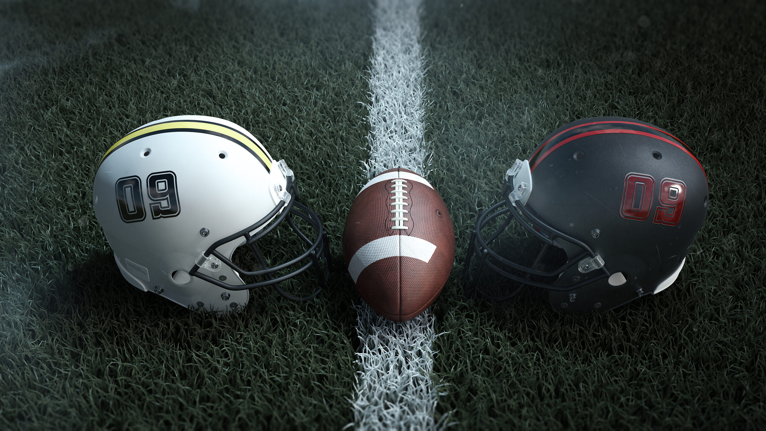 Dois capacetes de futebol americano em um campo com uma bola no meio